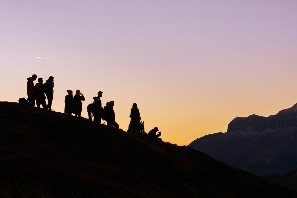 People climbing up a hill